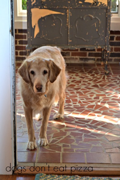 Hank on front porch outside living room in 1929 House - thediybungalow.com