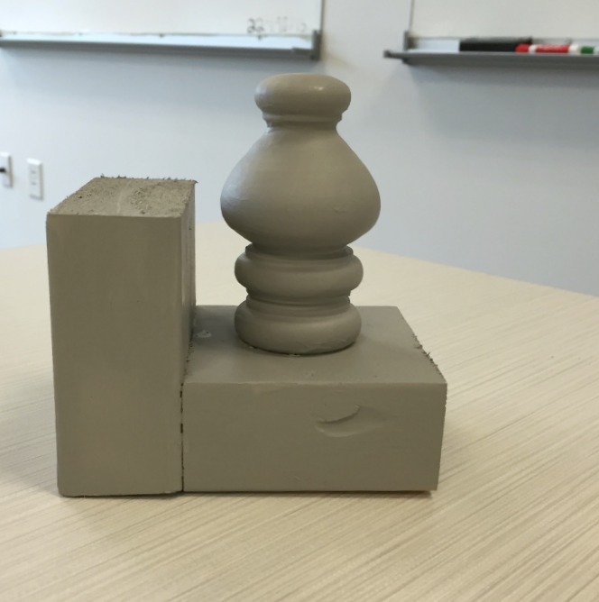 Repurposing curtain hardware - finial bookend painted - thediybungalow.com