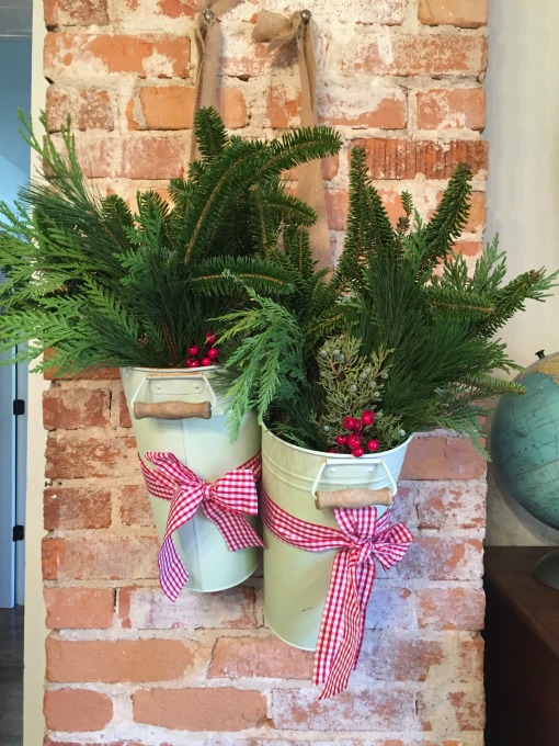 Holiday greenery in galvanized pails - thediybungalow.com