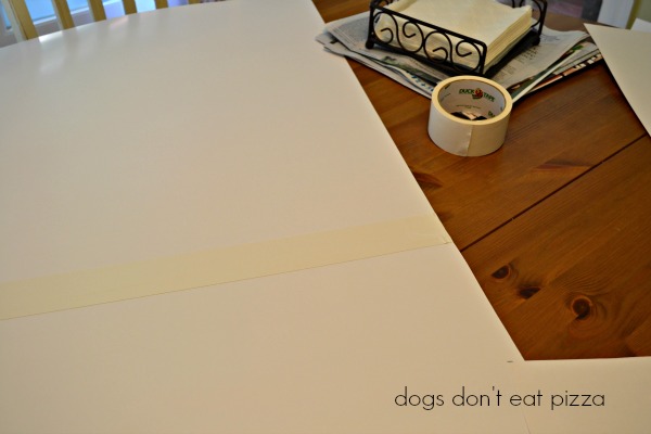 measure and tape poster board