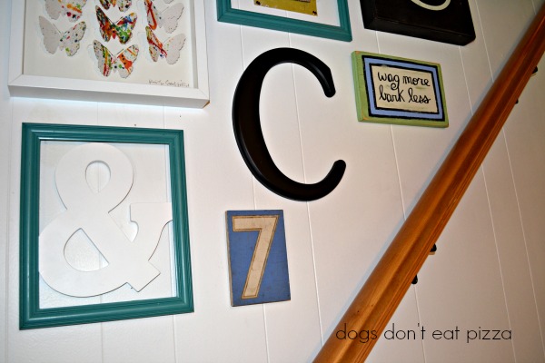 close-up-stairwell-gallery-wall - Dogs Don't Eat Pizza