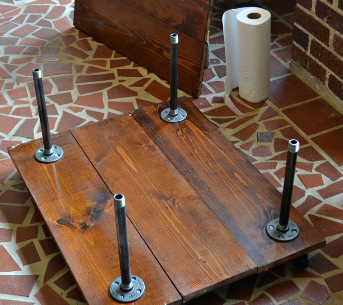Screw in nipples to flanges - DIY two-tier coffee table - Dogs Don't Eat Pizza