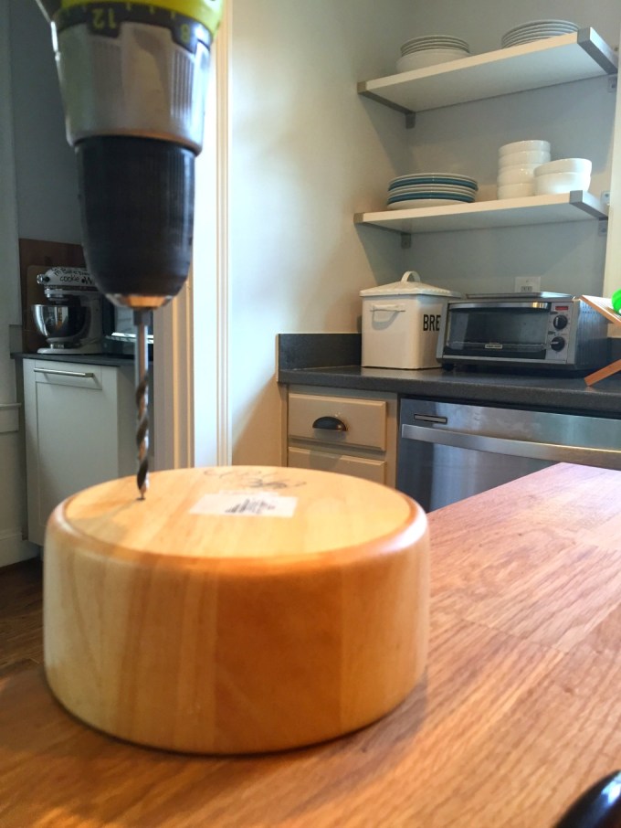 Drill hole in bowl from back for DIY wooden wall planters - thediybungalow.com